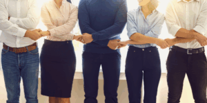 Hero header for a blog post on the 3 Common Challenges in Mergers and Acquisitions.